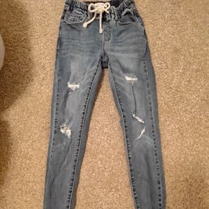 Ripped blue skinny jeans